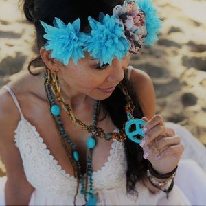 Floral headband and beaded “peace” necklace